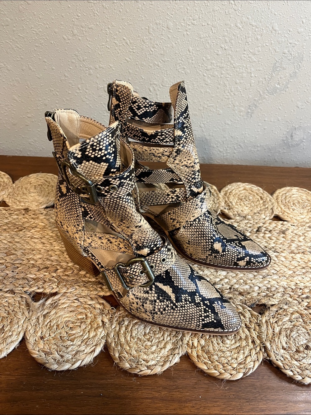 Cutout Snake-Print Ankle Booties in Beige/Black From the Buckle
